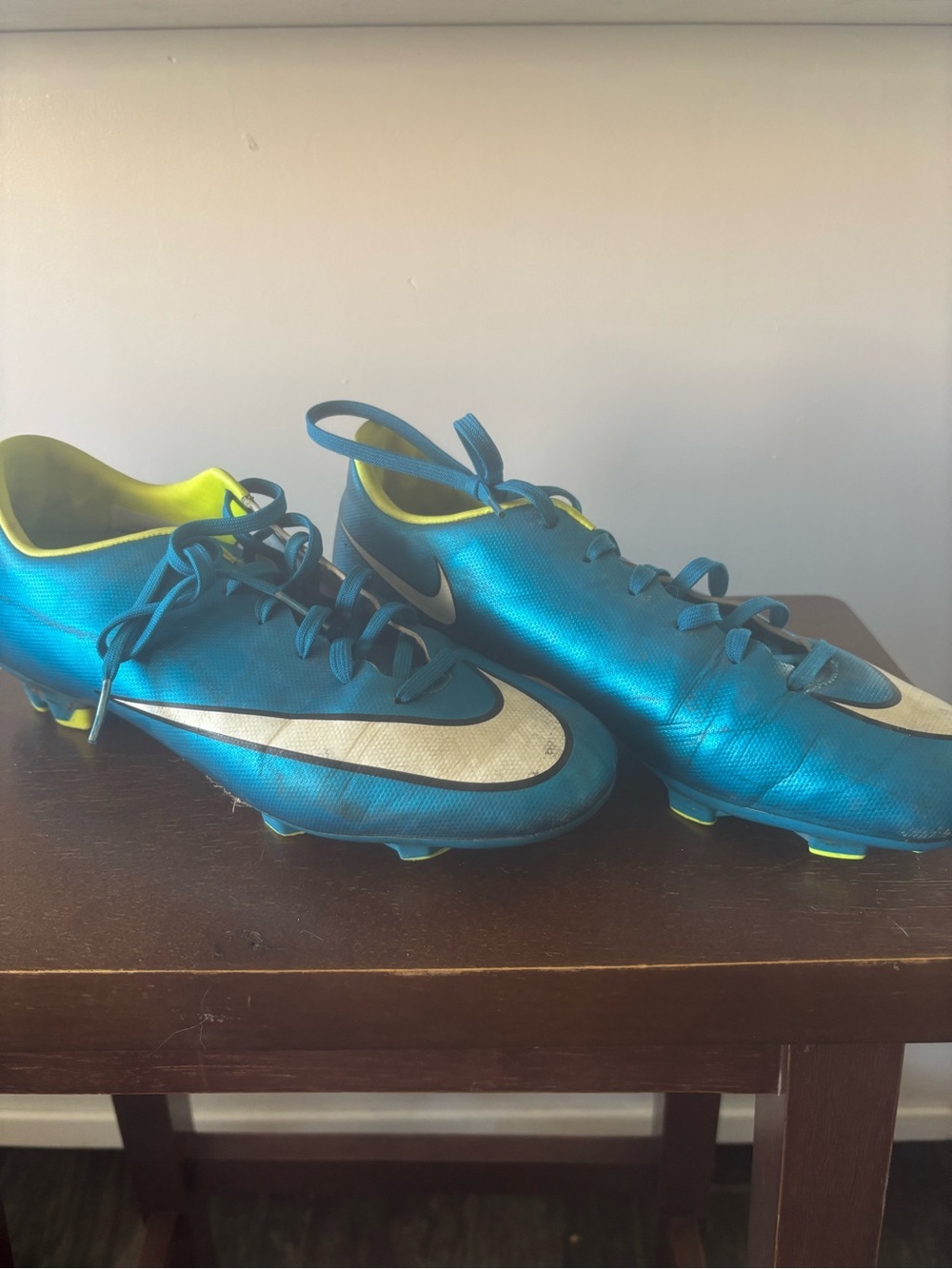 Nike Teal Soccer Cleats with Neon Yellow Lining